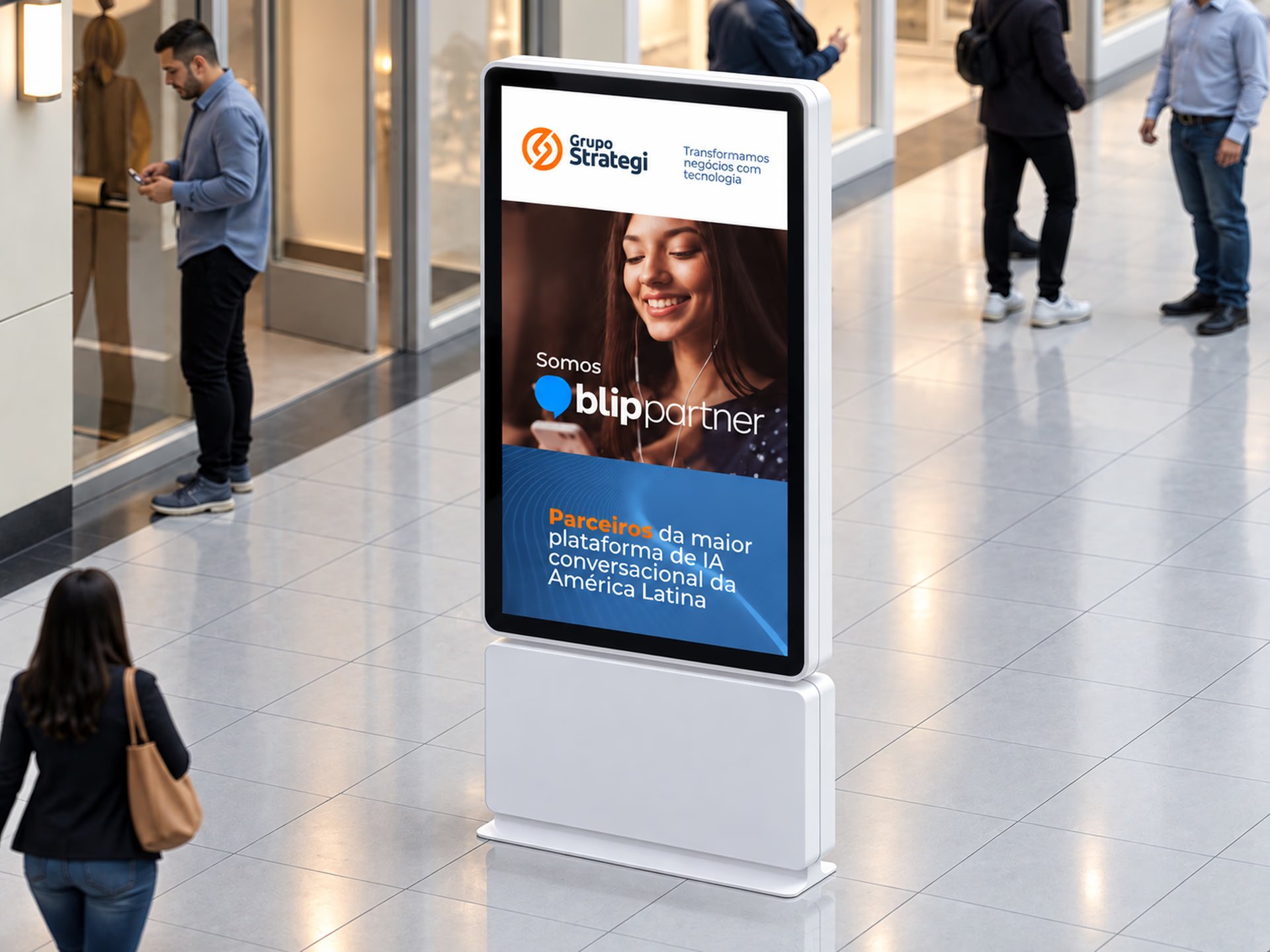 Digital totem in a mall showing a Grupo Strategi piece about its Blip partnership